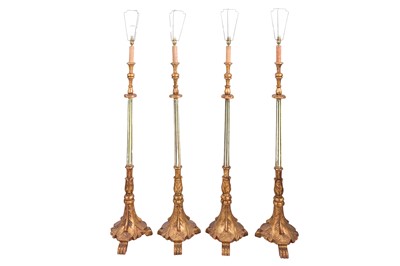 Lot 332 - A SET OF FOUR PAINTED AND PARCEL GILT STANDARD LAMPS