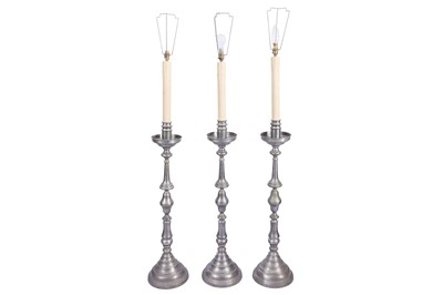 Lot 327 - A SET OFTHREE PEWTER COLOURED METAL STANDARD LAMPS