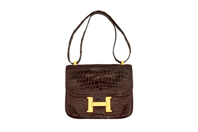 Lot 299 - λ Hermes Brown Shiny Crocodile Constance 23