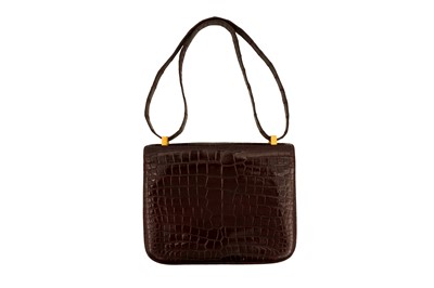 Lot 299 - λ Hermes Brown Shiny Crocodile Constance 23