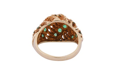 Lot 157 - AN EMERALD BOMBÉ RING, CIRCA 1979