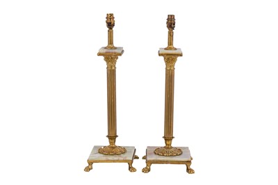 Lot 427 - A PAIR OF BRASS AND ONYX TABLE LAMPS