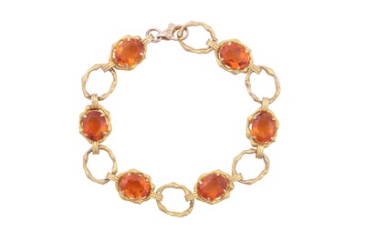 Lot 294 - A CITRINE FANCY-LINK BRACELET, CIRCA 1976