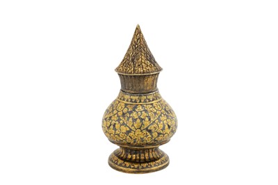 Lot 178 - A late 19th century Siamese (Thai) silver gilt niello lime bottle, Bangkok or Nakon Sri Thammarat circa 1880