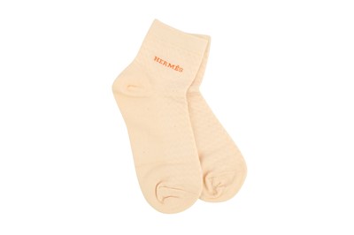 Lot 183 - Hermes Peach Logo Socks