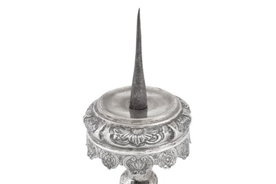 Lot 296 - A set of four mid-18th century German silver altar candlesticks (altarleuchter), Augsburg 1745-47 by Franz Christoph Mederle (master 1729, d. 1765)