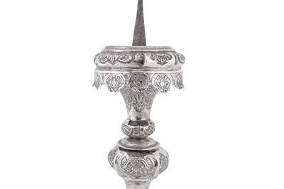 Lot 296 - A set of four mid-18th century German silver altar candlesticks (altarleuchter), Augsburg 1745-47 by Franz Christoph Mederle (master 1729, d. 1765)
