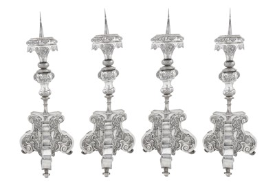 Lot 296 - A set of four mid-18th century German silver altar candlesticks (altarleuchter), Augsburg 1745-47 by Franz Christoph Mederle (master 1729, d. 1765)