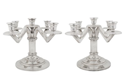 Lot 302 - A pair of mid-20th century French 950 standard silver five light candelabra, Paris circa 1950 by CH (untraced)