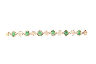 Lot 58 - A JADE BRACELET