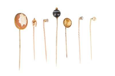 Lot 82 - A COLLECTION OF SEVEN STICK PINS