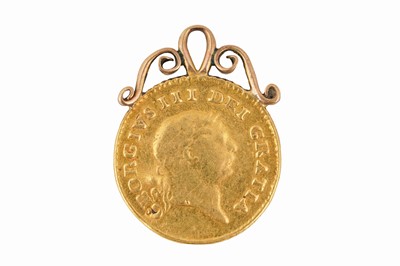 Lot 102 - A KING GEORGE III THIRD GUINEA (1/3) DATED 1810 MOUNTED AS A PENDANT