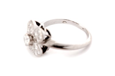 Lot 100 - VAN CLEEF & ARPELS | A DIAMOND 'TREFLE' RING