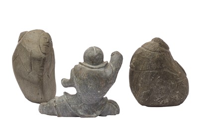 Lot 397 - A GROUP OF THREE CARVED STONE INUIT SCULPTURES