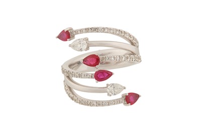 Lot 166 - A MULTI-BAND DIAMOND AND RUBY RING