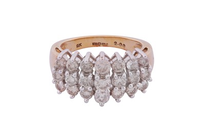 Lot 328 - A THREE-ROW DIAMOND RING