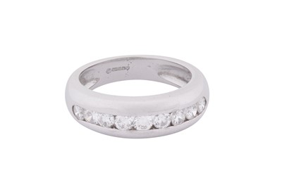 Lot 140 - A DIAMOND HALF ETERNITY RING