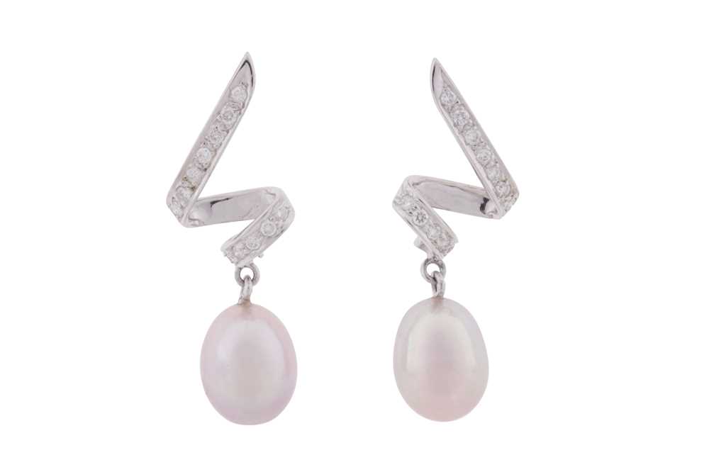 Lot 183 - A PAIR OF PEARL AND DIAMOND PENDENT EARRINGS