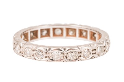 Lot 5 - A DIAMOND ETERNITY RING