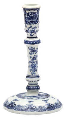 Lot 55 - A CHINESE BLUE AND WHITE CANDLESTICK