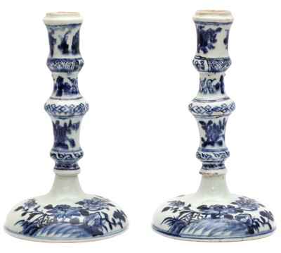 Lot 57 - A PAIR OF CHINESE BLUE AND WHITE CANDLESTICKS