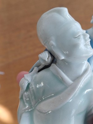 Lot 473 - A Chinese glazed biscuit figure group, Qing dynasty, Qianlong period