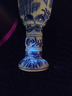 Lot 433 - A pair of Chinese blue and white goblets, Qing dynasty, Kangxi period