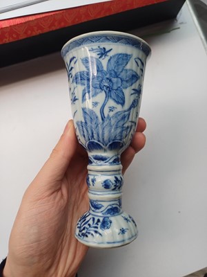 Lot 433 - A pair of Chinese blue and white goblets, Qing dynasty, Kangxi period
