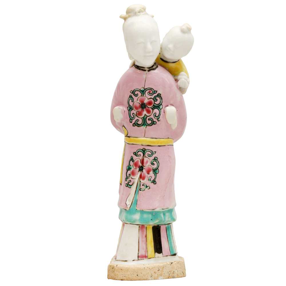 Lot 470 - A Chinese famille-rose 'lady and child' figure, Qing dynasty, Qianlong period