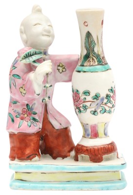 Lot 74 - A CHINESE FAMILLE-ROSE 'BOY AND VASE' FIGURE GROUP