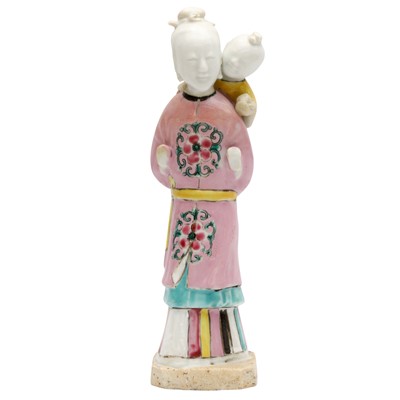 Lot 472 - A Chinese famille-rose 'lady and child' figure, Qing dynasty, Qianlong period
