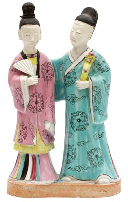 Lot 69 - A CHINESE FAMILLE-ROSE 'COUPLE' FIGURE GROUP