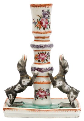 Lot 67 - A RARE CHINESE FAMILLE-ROSE 'DOGS' CANDLESTICK