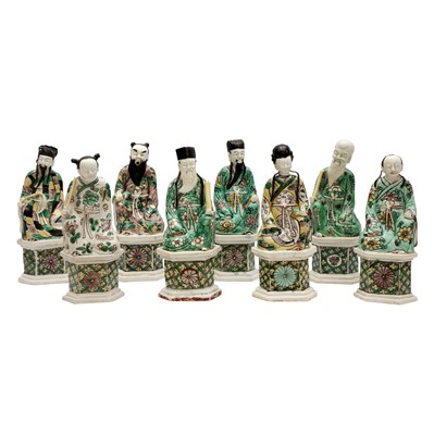 Lot 199 - A rare set of eight Chinese famille-verte 'Daoist immortal' figures, Qing dynasty, Kangxi period