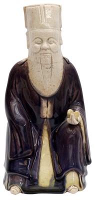 Lot 16 - A CHINESE BISCUIT FIGURE OF AN OFFICIAL