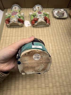 Lot 429 - A Chinese biscuit figure of an official, Qing dynasty, Kangxi period