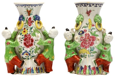 Lot 79 - A PAIR OF CHINESE FAMILLE-ROSE 'BOYS' WALL VASES