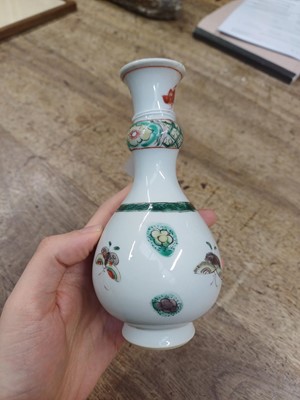 Lot 423 - A small Chinese famille-verte 'butterflies' vase, Qing dynasty, Kangxi period