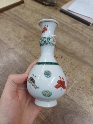 Lot 423 - A small Chinese famille-verte 'butterflies' vase, Qing dynasty, Kangxi period