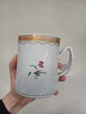 Lot 462 - A Chinese famille-rose armorial mug, Qing dynasty, Qianlong period