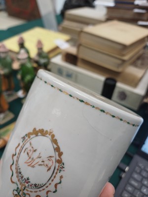 Lot 462 - A Chinese famille-rose armorial mug, Qing dynasty, Qianlong period