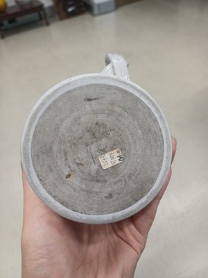 Lot 462 - A Chinese famille-rose armorial mug, Qing dynasty, Qianlong period