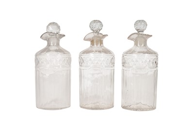 Lot 337 - A SET OF THREE GEORGE III GLASS SPIRIT DECANTERS, CIRCA 1880S