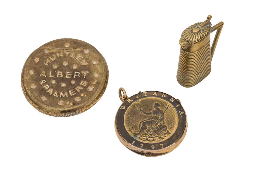 Lot 280 - A group of three early 20th century novelty brass vesta cases