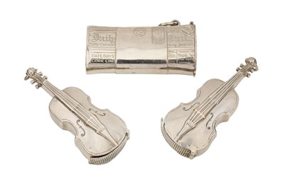 Lot 275 - A group of three early 20th century novelty base metal vesta cases