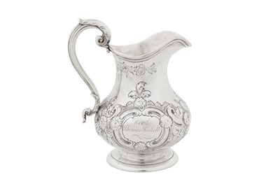 Lot 395 - Social interest - A Victorian sterling silver milk jug, London 1849 by John Samuel Hunt