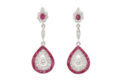 Lot 40 - A PAIR OF DIAMOND AND RUBY PENDENT EARRINGS