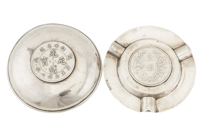 Lot 550 - Two mid-20th century Chinese export silver coin set ashtrays, Shanghai circa 1940 retailed by Nanking Store