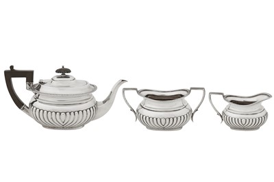 Lot 379 - An Edwardian sterling silver bachelor's three-piece tea service, Sheffield 1907 by Joseph Rodgers and Sons