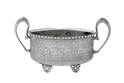 Lot 218 - An early 20th century Persian (Iranian) unmarked silver and niello twin handled sugar bowl, Tabriz circa 1930